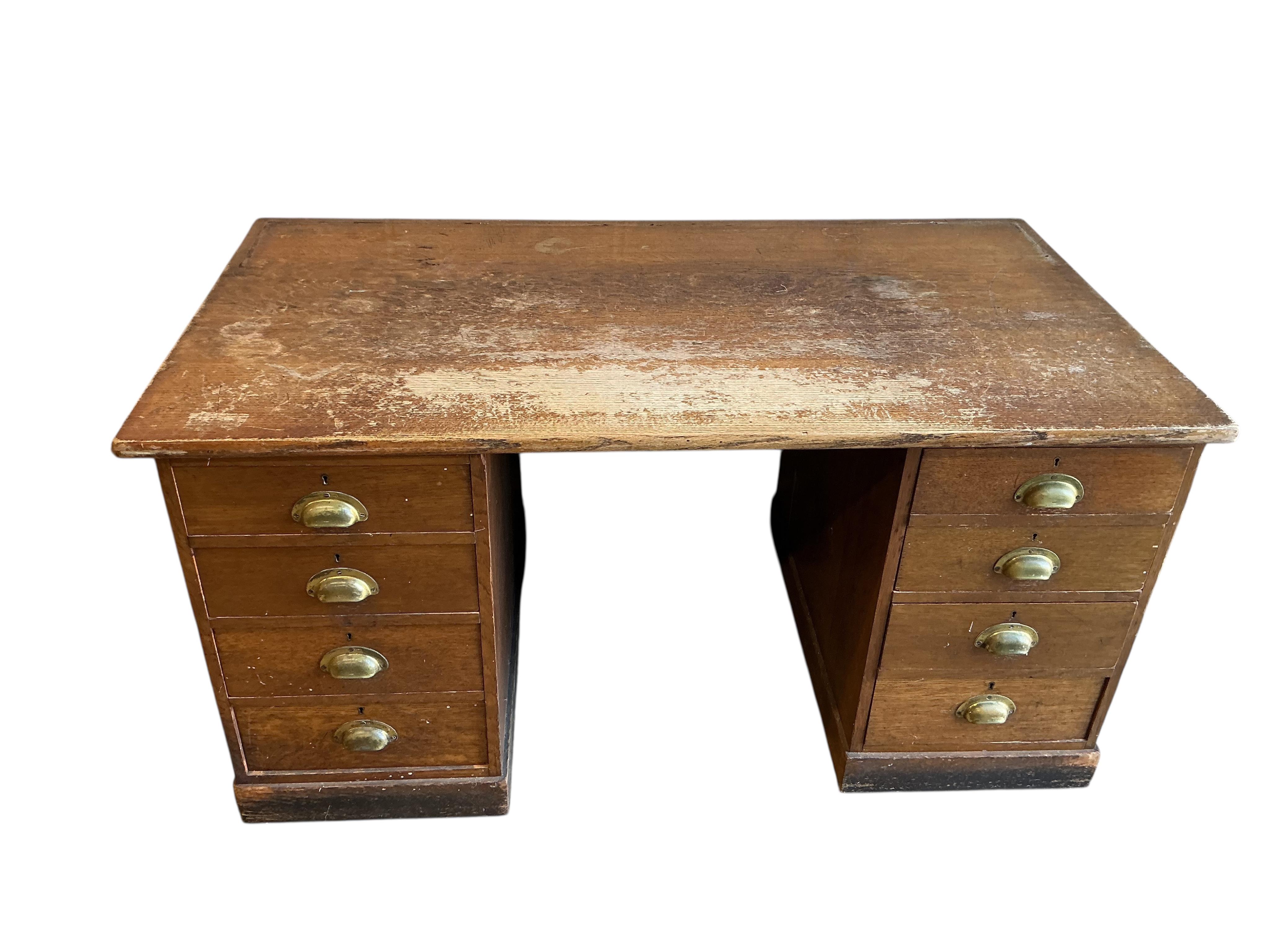 An early 20th century oak pedestal desk, adapted, width 152cm, depth 83cm, height 77cm